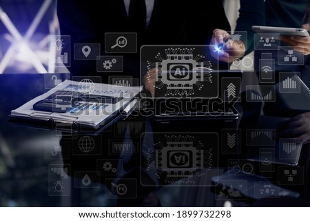 Business teamwork or business partners discussing documents and meeting at the modern office desk,  Innovation graphs interfaces icon, Workplace strategy concept, blurred background.