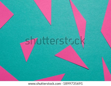 Abstract background made of paper pink and turquoise