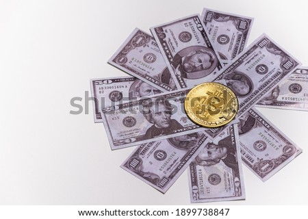 bitcoin lies on banknotes, dollars. on white background