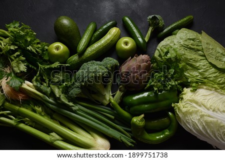 Assortment of fresh fruits and vegetables. Healthy food background. Shopping food in supermarket