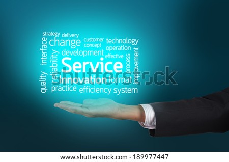 Businessman hand holding word tags of Service