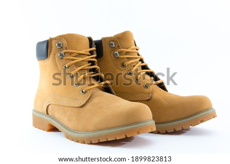 
Light brown leather shoes on a white background Royalty-Free Stock Photo #1899823813