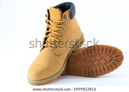 
Light brown leather shoes on a white background Royalty-Free Stock Photo #1899823816