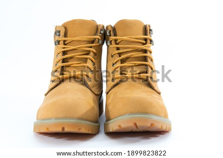 
Light brown leather shoes on a white background Royalty-Free Stock Photo #1899823822