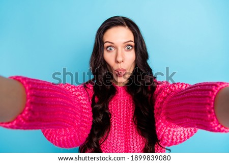 Photo of funky positive lady make selfie tongue out have good mood isolated on blue color background