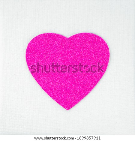 Rose glitter heart in the white pictures frame. Love or Valentines concept. High quality photo