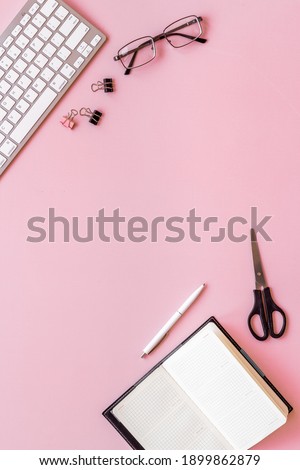 Office table desk flat lay. Workspace with laptop and office supplies