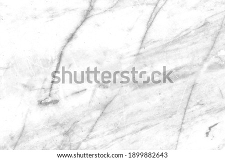 Cracked white stone marble wall texture and seamless background