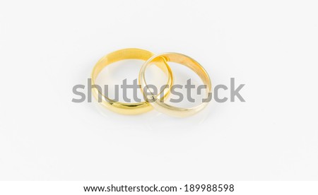 pair wedding golden ring on a white background