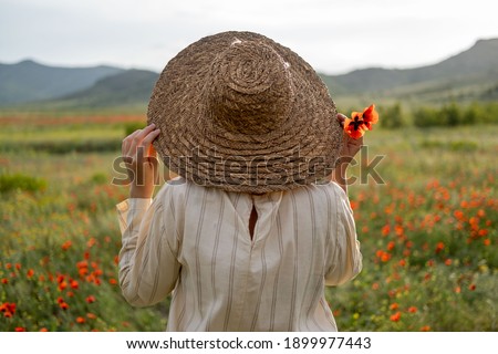 Girl with the hat at Georgian landscape