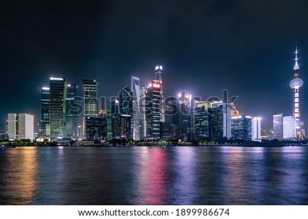 City skyline at night. Viewed Lujiazui District and huangpu river from the n North Bund in Shanghai,China
