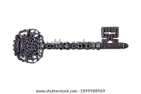 Beautiful antique key isolated on white background                                Royalty-Free Stock Photo #1899988969
