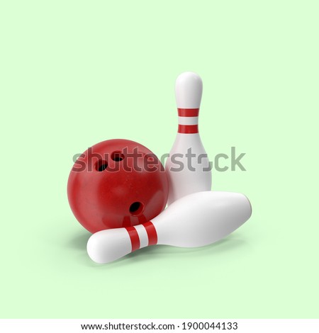 A closeup shot of two bowling pins and a ball on a green background