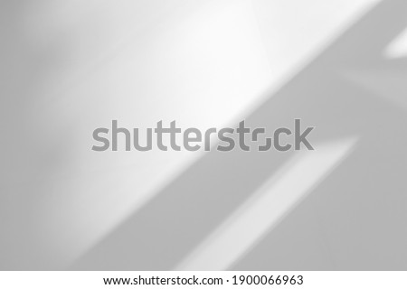 Abstract shadow and striped diagonal light background on white wall  from window,  architecture dark gray and sunshine diagonal geometric effect overlay for backdrop and mockup design

