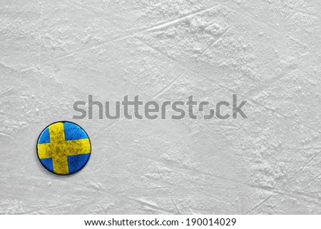 Washer with the image of the Swedish flag on a hockey rink