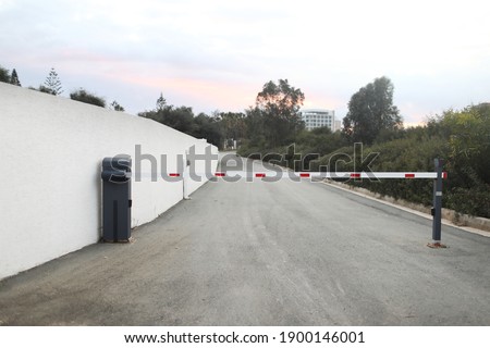 parking barrier system, automatic car park security system. barrier to the closed area of the hotel.