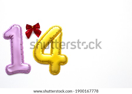 number 14 on a white background, pink and gold, red bow. Valentine's day, symbol. Place for your text.