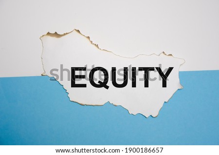 word equity written on a white sheet of paper on a white blue-blue background. High quality photo
