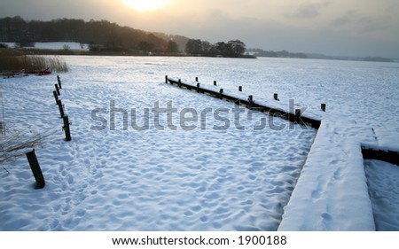 sunny  iced  lake in denmark in winter