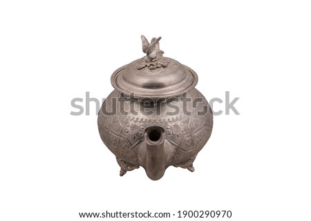 An antique kettle of copper - silver isolated on white background 