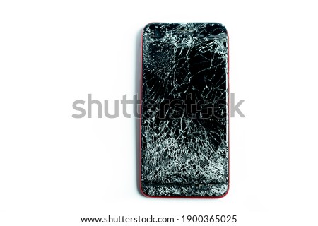 broken phone on a white background, broken electronics close-up