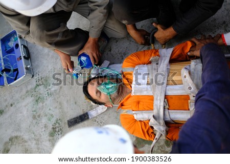 Rescue person from enclose space on shipboard Royalty-Free Stock Photo #1900383526