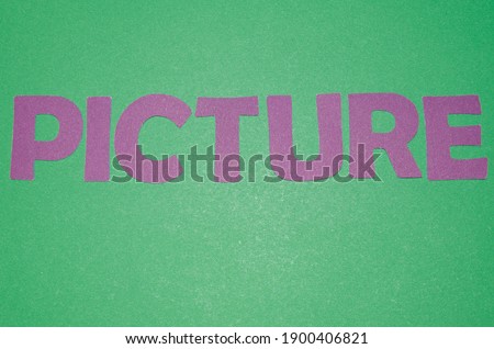 'PICTURE' word made  of letters. Words on a green background.