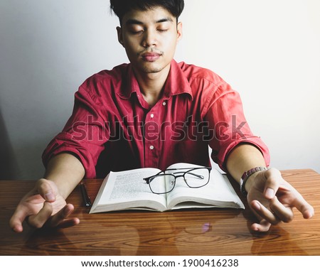 Man doing meditation for reading 