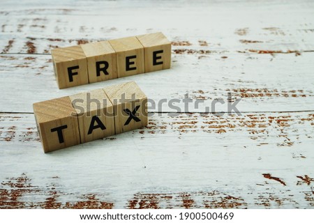 Tax Free Word alphabet letters on wooden background