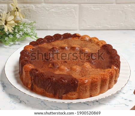 Marble cake is one of classic butter cake has spesific marble motif in each slice