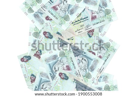 500 UAE dirhams bills flying down isolated on white. Many banknotes falling with white copy space on left and right side