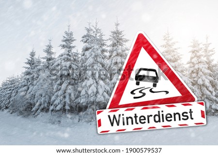 warning sign German word Winterdienst (winter services) with car for ic smoothness at the winter season