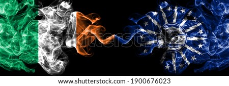 Republic of Ireland, Irish vs United States of America, America, US, USA, American, Buffalo, New York smoky mystic flags placed side by side. Thick colored silky abstract smoke flags.