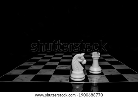 Chess is photographed on a chessboard. Table games.  Strategy games.  Creative minimal concept.  Game of chess.  Strategy, management or leadership concept.  Business success concept.