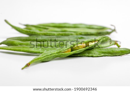 common bean or dolichos bean pods, farm fresh concept Royalty-Free Stock Photo #1900692346