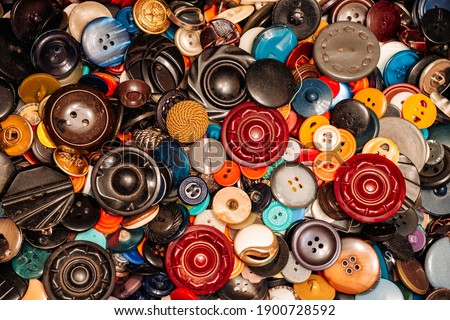 
Background from a variety of buttons from clothes
