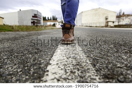 Person walking on road direction line, traffic sign and symbol