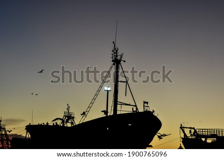 silhouette of ship at sunset, beautiful photo digital picture