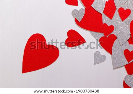 Red Heart With Heap Of Hearts On Textured White