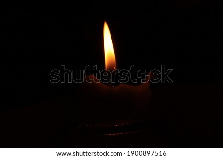This is a picture of beautiful cndle flame.