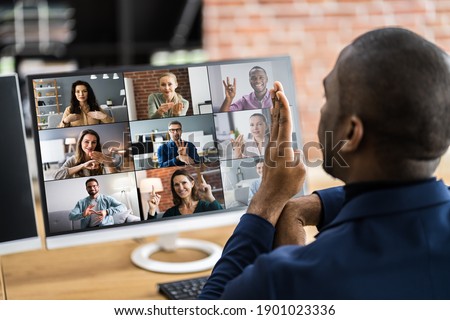 Disabled Deaf Man In Video Conference Call Royalty-Free Stock Photo #1901023336