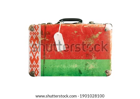Old suitcase with the flag of Belarus. Isolated on a white background