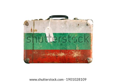 Old suitcase with the flag of Bulgaria. Isolated on a white background