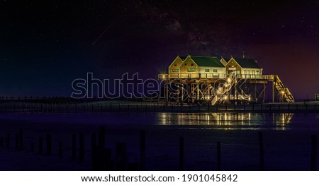 Night view with starry sky from the booth near Sankt Peter-Ording, Schleswig-Holstein, Germany.