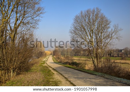 Road in the countryside next to a river