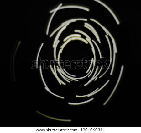 Blurred yellow glow illumination circle isolated on black background