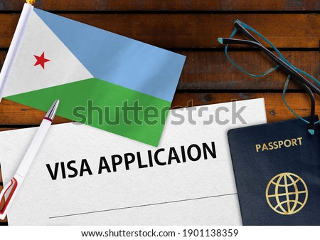 Flag of Djibouti , visa application form and passport on table
