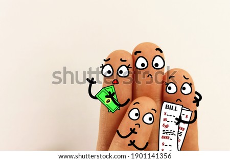 Four fingers are decorated as four person. They are worried. They have not enough money. Royalty-Free Stock Photo #1901141356