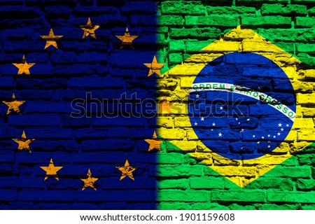 Flag of Europe and Brazil on the brick wall