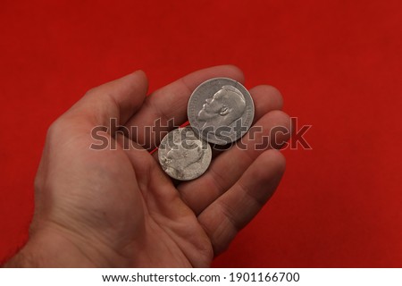 Old Russian silver coins in hand
